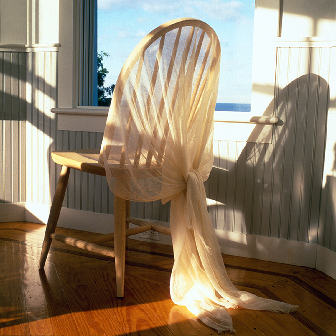 chair with gauze fabric in sunlight