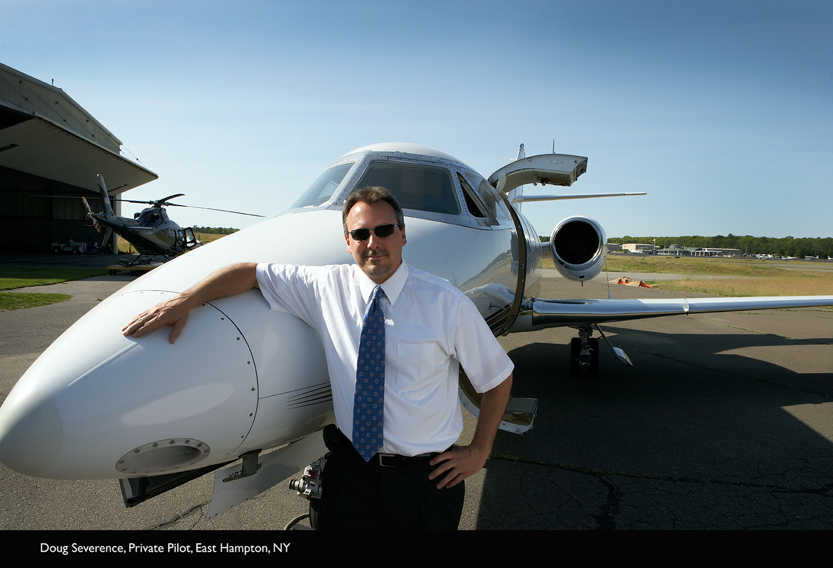 man standing in front of jet plane