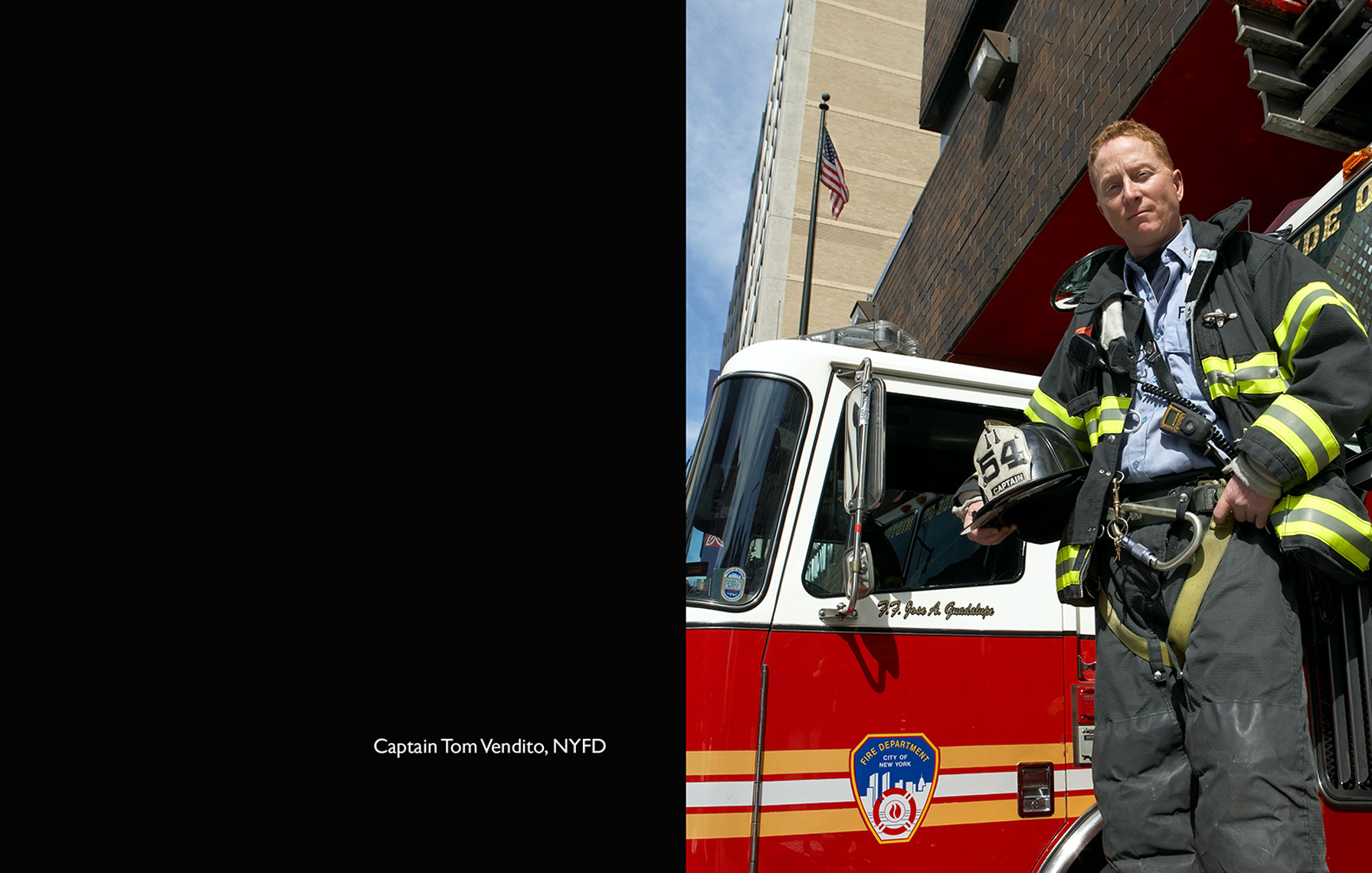 fireman standing in front of fire truck fire station